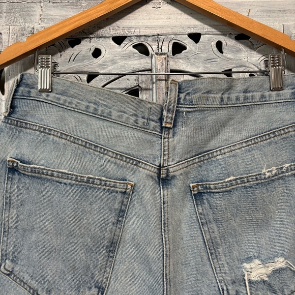 AGOLDE Criss Cross Symbol Medium Indigo Wash Asymmetrical Cutoff Jean Shorts - Picture 8 of 11